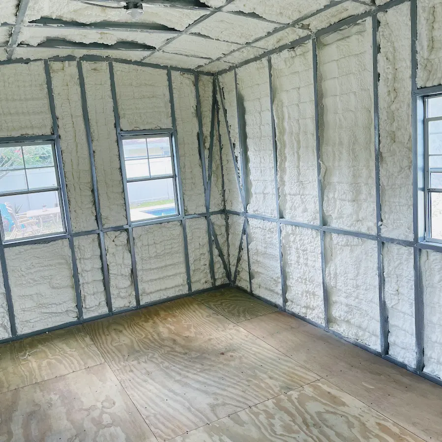 Closed-cell spray foam insulation applied to wall cavities in a residential project in Rock Falls